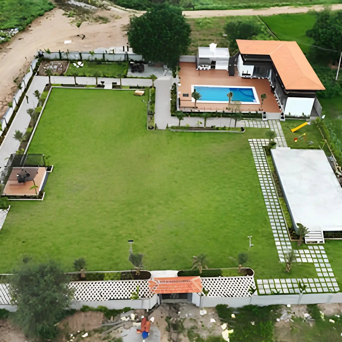 Modern residential estate featuring spacious lawns, clubhouse, swimming pool, gardens, and integrated green infrastructure.
